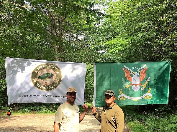 Ling Wong on Appalachian Trail with Special Forces Regimental Flag